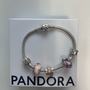 Pandora Silver and Pink Charm Bracelet with three charms and two spacers